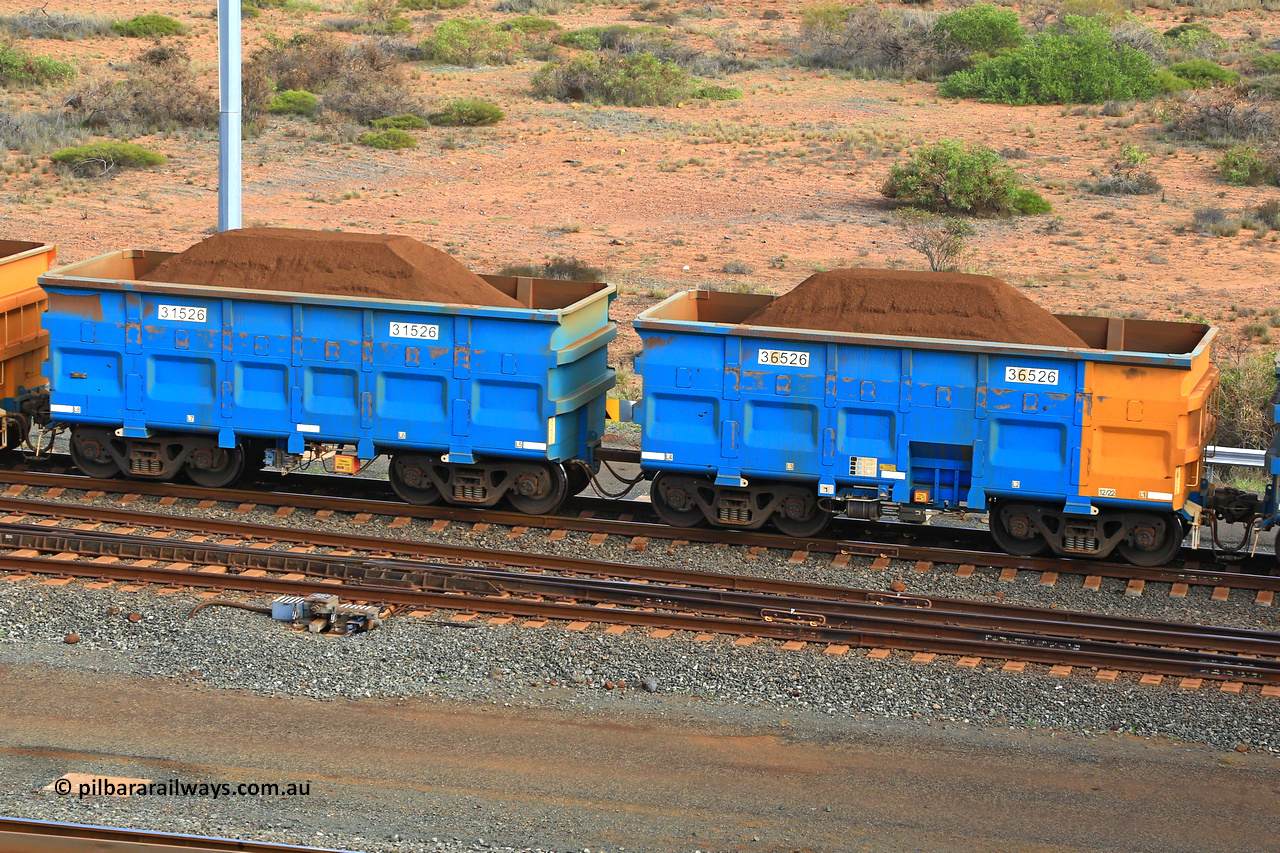 240619 0407
Cape Lambert yard, one of Rio Tinto's blue rakes with spring park brake and only electronic controlled pneumatic [ECP] braking, waggon pair 31526 is a master and is bar coupled to slave waggon 36526 built by China Northen as a Q type in 12/2022. Captured on June 19, 2024.
Keywords: 31526;36526;Q-type;China-Northern;Rio-ore-waggon;