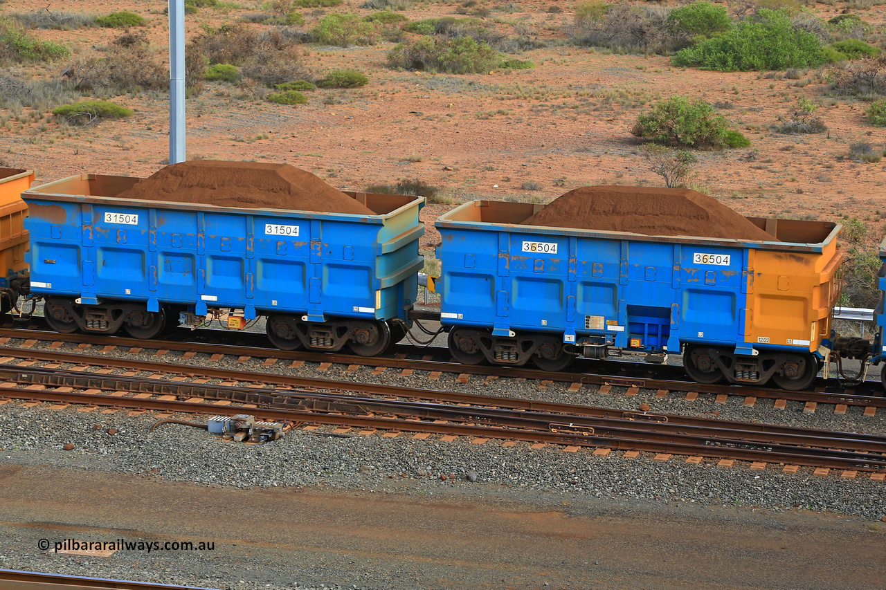 240619 0417
Cape Lambert yard, one of Rio Tinto's blue rakes with spring park brake and only electronic controlled pneumatic [ECP] braking, waggon pair 31504 is a master and is bar coupled to slave waggon 36504 built by China Northen as a Q type in 12/2022. Captured on June 19, 2024.
Keywords: 31504;36504;Q-type;China-Northern;Rio-ore-waggon;