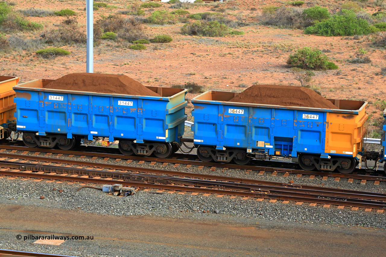 240619 0421
Cape Lambert yard, one of Rio Tinto's blue rakes with spring park brake and only electronic controlled pneumatic [ECP] braking, waggon pair 31447 is a master and is bar coupled to slave waggon 36447 built by China Northen as a Q type in 12/2022. Captured on June 19, 2024.
Keywords: 31447;36447;Q-type;China-Northern;Rio-ore-waggon;