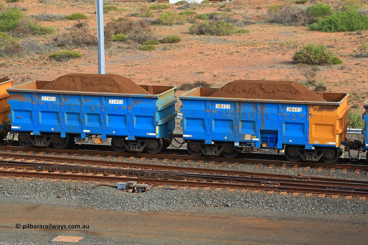 240619 0434
Cape Lambert yard, one of Rio Tinto's blue rakes with spring park brake and only electronic controlled pneumatic [ECP] braking, waggon pair 31453 is a master and is bar coupled to slave waggon 36453 built by China Northen as a Q type in 12/2022. Captured on June 19, 2024.
Keywords: 31453;36453;Q-type;China-Northern;Rio-ore-waggon;