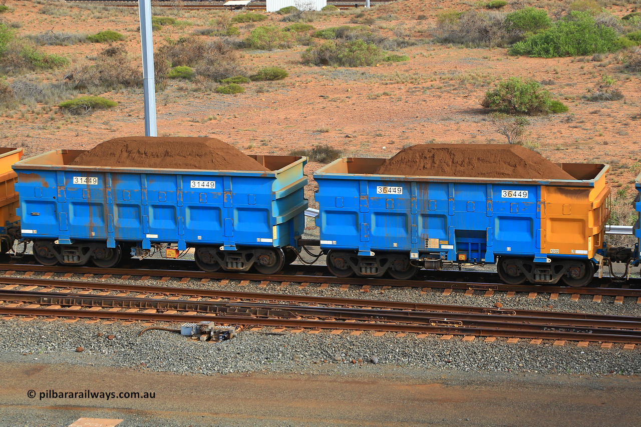 240619 0442
Cape Lambert yard, one of Rio Tinto's blue rakes with spring park brake and only electronic controlled pneumatic [ECP] braking, waggon pair 31449 is a master and is bar coupled to slave waggon 36449 built by China Northen as a Q type in 12/2022. Captured on June 19, 2024.
Keywords: 31449;36449;Q-type;China-Northern;Rio-ore-waggon;