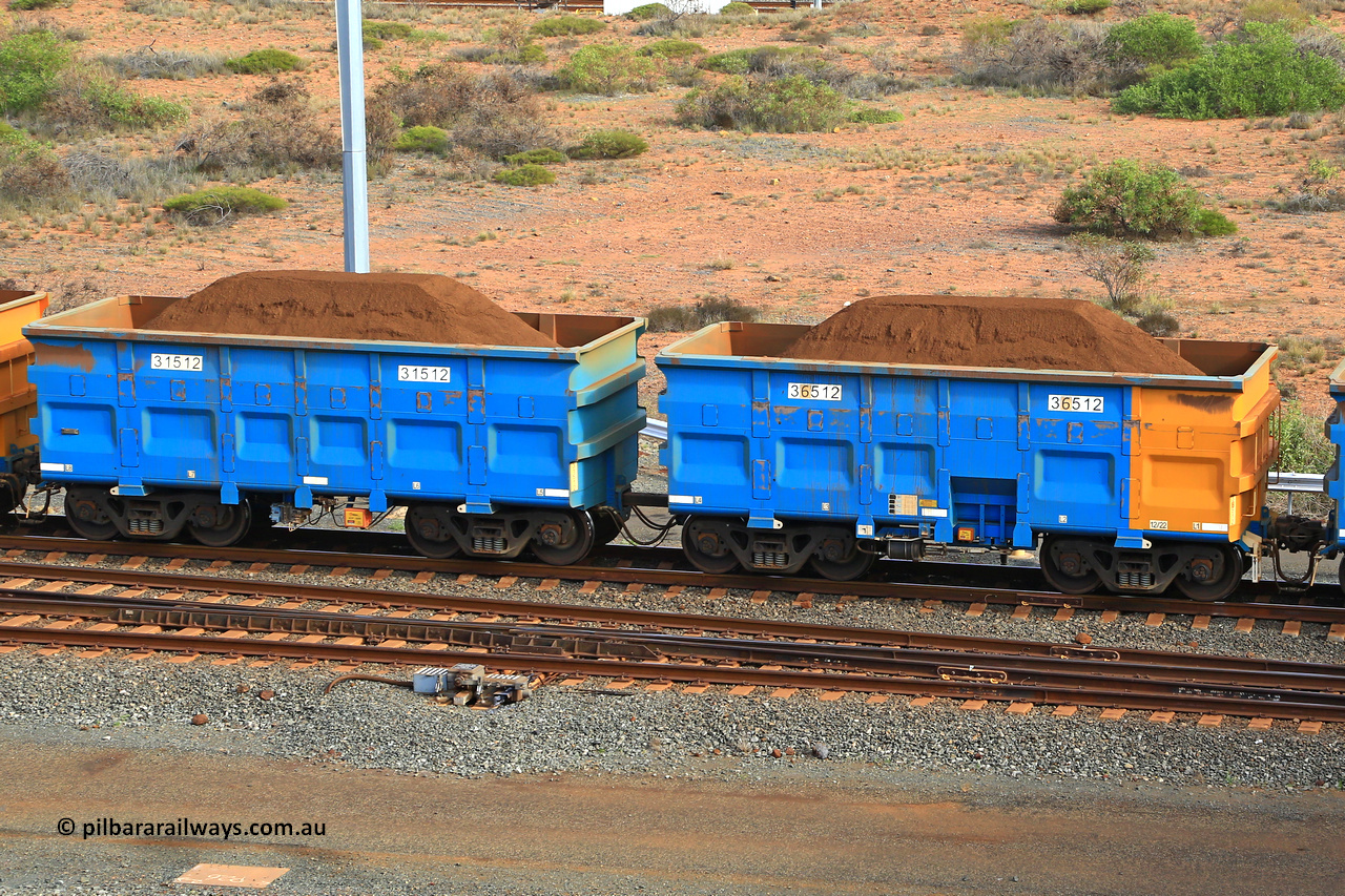 240619 0444
Cape Lambert yard, one of Rio Tinto's blue rakes with spring park brake and only electronic controlled pneumatic [ECP] braking, waggon pair 31512 is a master and is bar coupled to slave waggon 36512 built by China Northen as a Q type in 12/2022. Captured on June 19, 2024.
Keywords: 31512;36512;Q-type;China-Northern;Rio-ore-waggon;