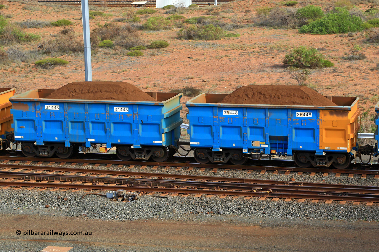 240619 0446
Cape Lambert yard, one of Rio Tinto's blue rakes with spring park brake and only electronic controlled pneumatic [ECP] braking, waggon pair 31448 is a master and is bar coupled to slave waggon 36448 built by China Northen as a Q type in 12/2022. Captured on June 19, 2024.
Keywords: 31448;36448;Q-type;China-Northern;Rio-ore-waggon;