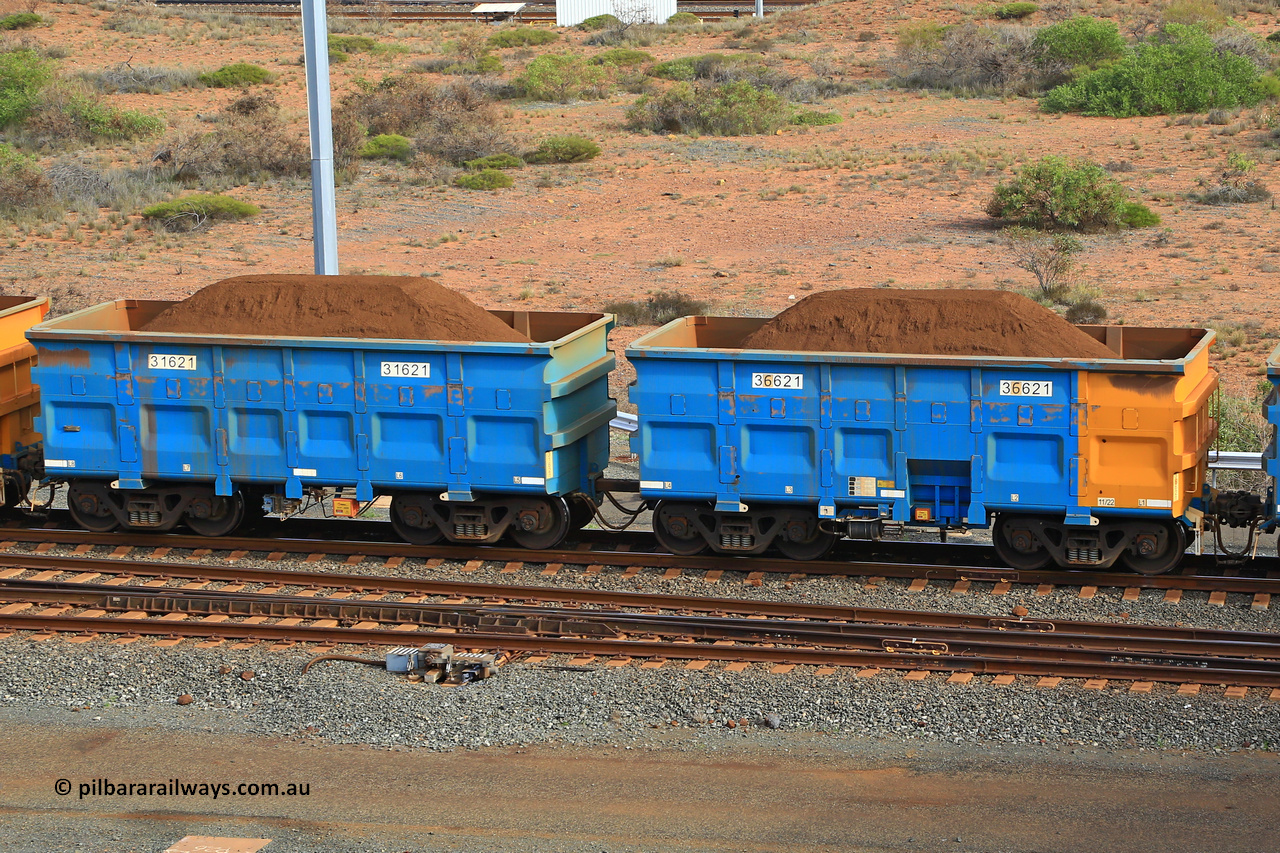 240619 0448
Cape Lambert yard, one of Rio Tinto's blue rakes with spring park brake and only electronic controlled pneumatic [ECP] braking, waggon pair 31621 is a master and is bar coupled to slave waggon 36621 built by China Northen as a Q type in 11/2022. Captured on June 19, 2024.
Keywords: 31621;36621;Q-type;China-Northern;Rio-ore-waggon;