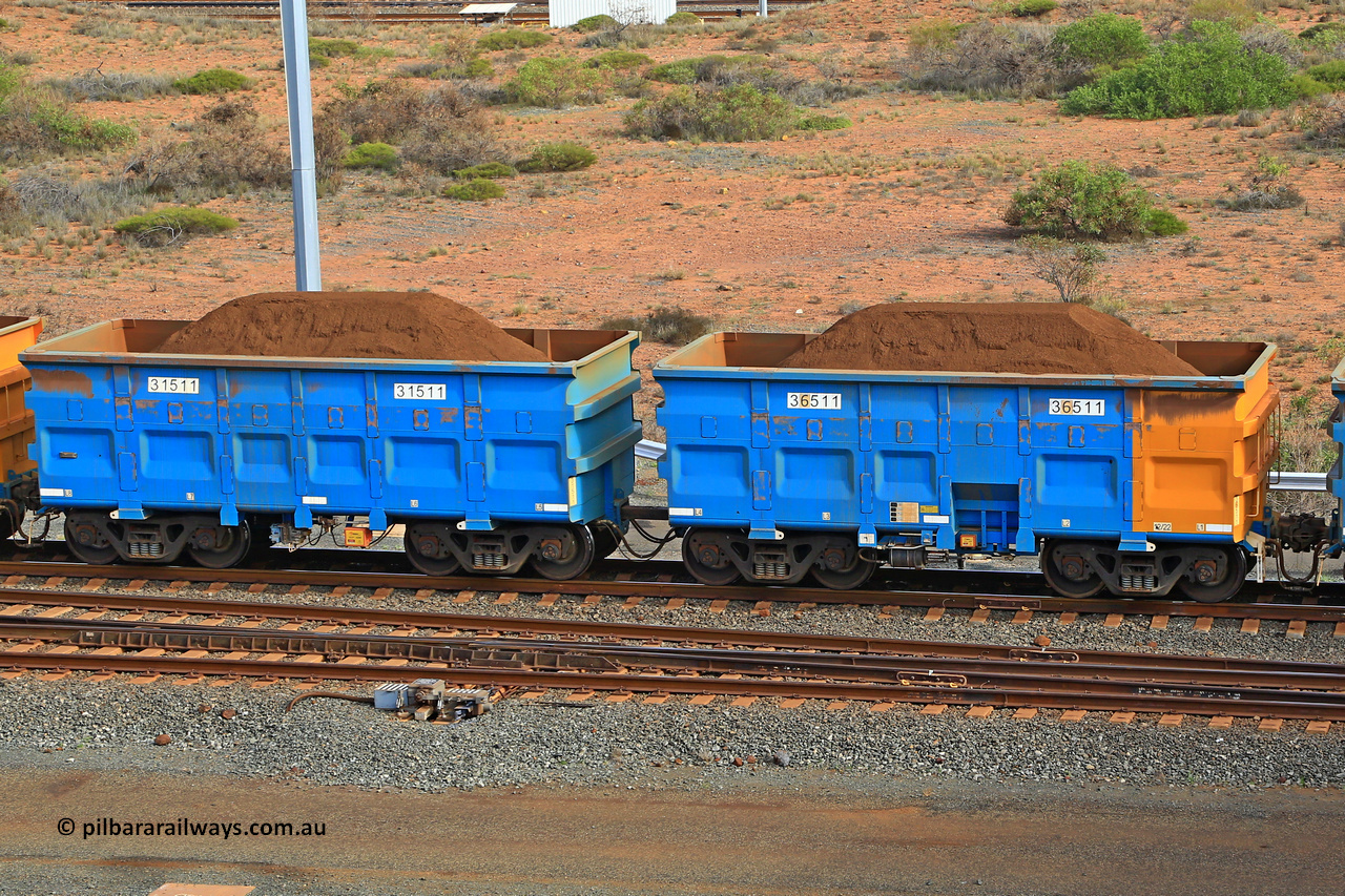 240619 0449
Cape Lambert yard, one of Rio Tinto's blue rakes with spring park brake and only electronic controlled pneumatic [ECP] braking, waggon pair 31511 is a master and is bar coupled to slave waggon 36511 built by China Northen as a Q type in 12/2022. Captured on June 19, 2024.
Keywords: 31511;36511;Q-type;China-Northern;Rio-ore-waggon;