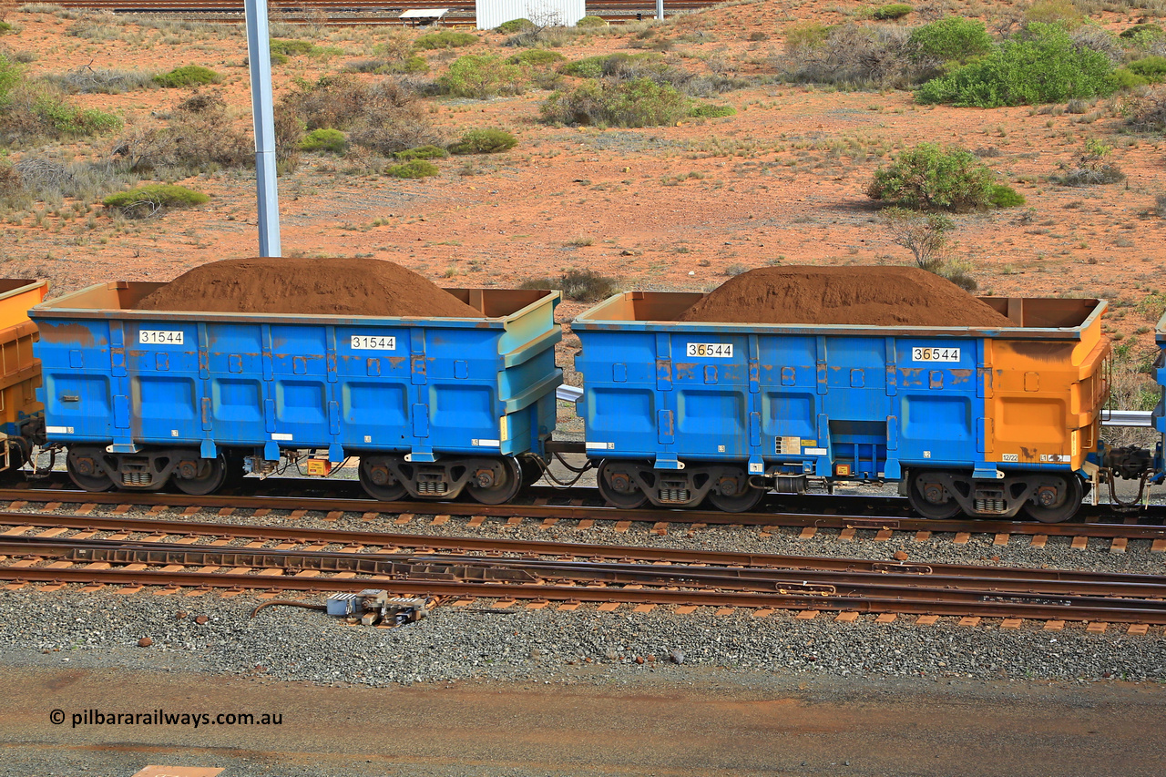240619 0450
Cape Lambert yard, one of Rio Tinto's blue rakes with spring park brake and only electronic controlled pneumatic [ECP] braking, waggon pair 31544 is a master and is bar coupled to slave waggon 36544 built by China Northen as a Q type in 12/2022. Captured on June 19, 2024.
Keywords: 31544;36544;Q-type;China-Northern;Rio-ore-waggon;