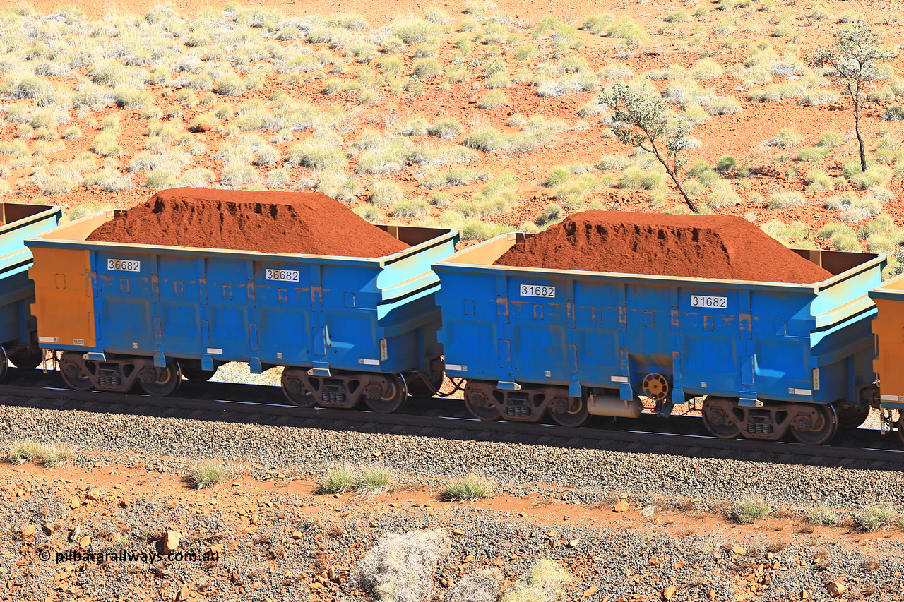 240701 2391
Western Creek, 67 km, one of Rio Tinto's blue rakes with spring assisted park brake and only electronic controlled pneumatic [ECP] braking, waggon pair 31682 is a master and is bar coupled to slave waggon 36682 built by China Northen as a Q type in 11/2022. Captured on July 1, 2024.
Keywords: 31682;36682;Q-type;China-Northern;Rio-ore-waggon;