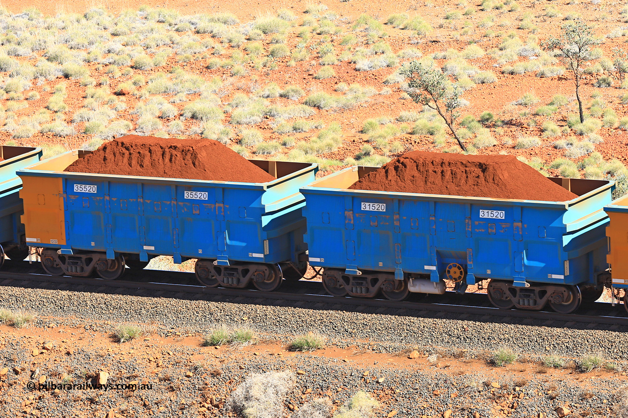 240701 2397
Western Creek, 67 km, one of Rio Tinto's blue rakes with spring assisted park brake and only electronic controlled pneumatic [ECP] braking, waggon pair 31520 is a master and is bar coupled to slave waggon 35520 built by China Northen as a Q type in 12/2022. Captured on July 1, 2024.
Keywords: 31520;35520;Q-type;China-Northern;Rio-ore-waggon;