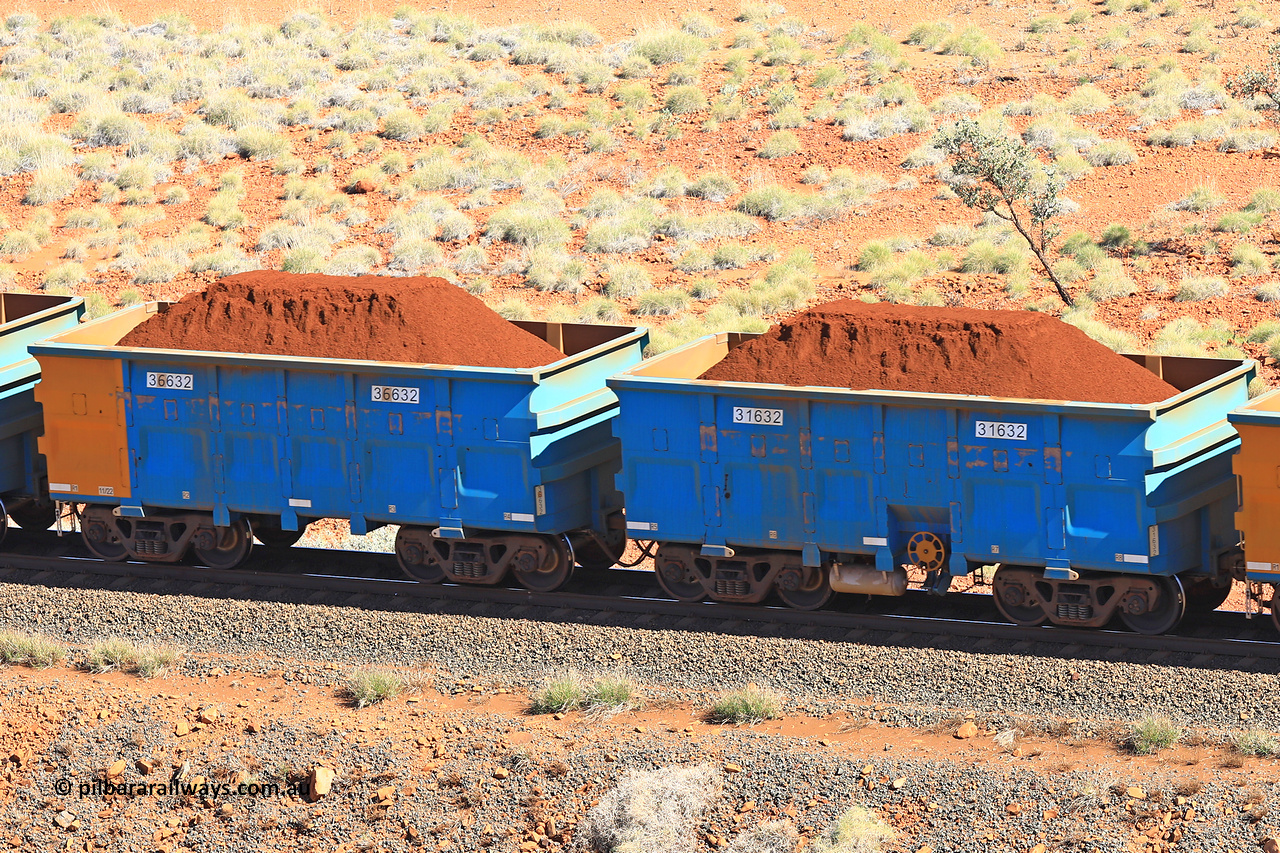 240701 2403
Western Creek, 67 km, one of Rio Tinto's blue rakes with spring assisted park brake and only electronic controlled pneumatic [ECP] braking, waggon pair 31632 is a master and is bar coupled to slave waggon 36632 built by China Northen as a Q type in 11/2022. Captured on July 1, 2024.
Keywords: 31632;36632;Q-type;China-Northern;Rio-ore-waggon;