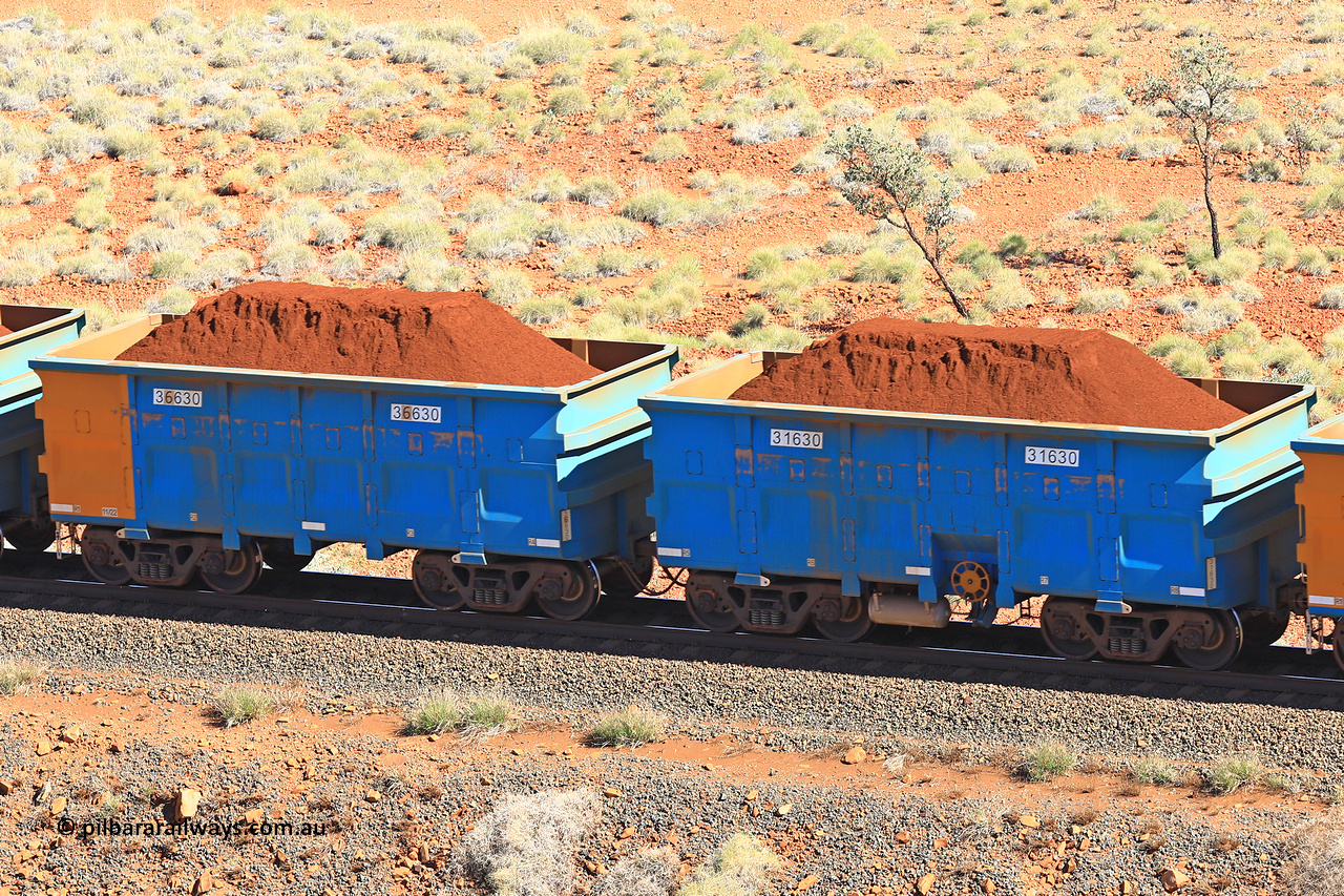 240701 2407
Western Creek, 67 km, one of Rio Tinto's blue rakes with spring assisted park brake and only electronic controlled pneumatic [ECP] braking, waggon pair 31630 is a master and is bar coupled to slave waggon 36630 built by China Northen as a Q type in 11/2022. Captured on July 1, 2024.
Keywords: 31630;36630;Q-type;China-Northern;Rio-ore-waggon;