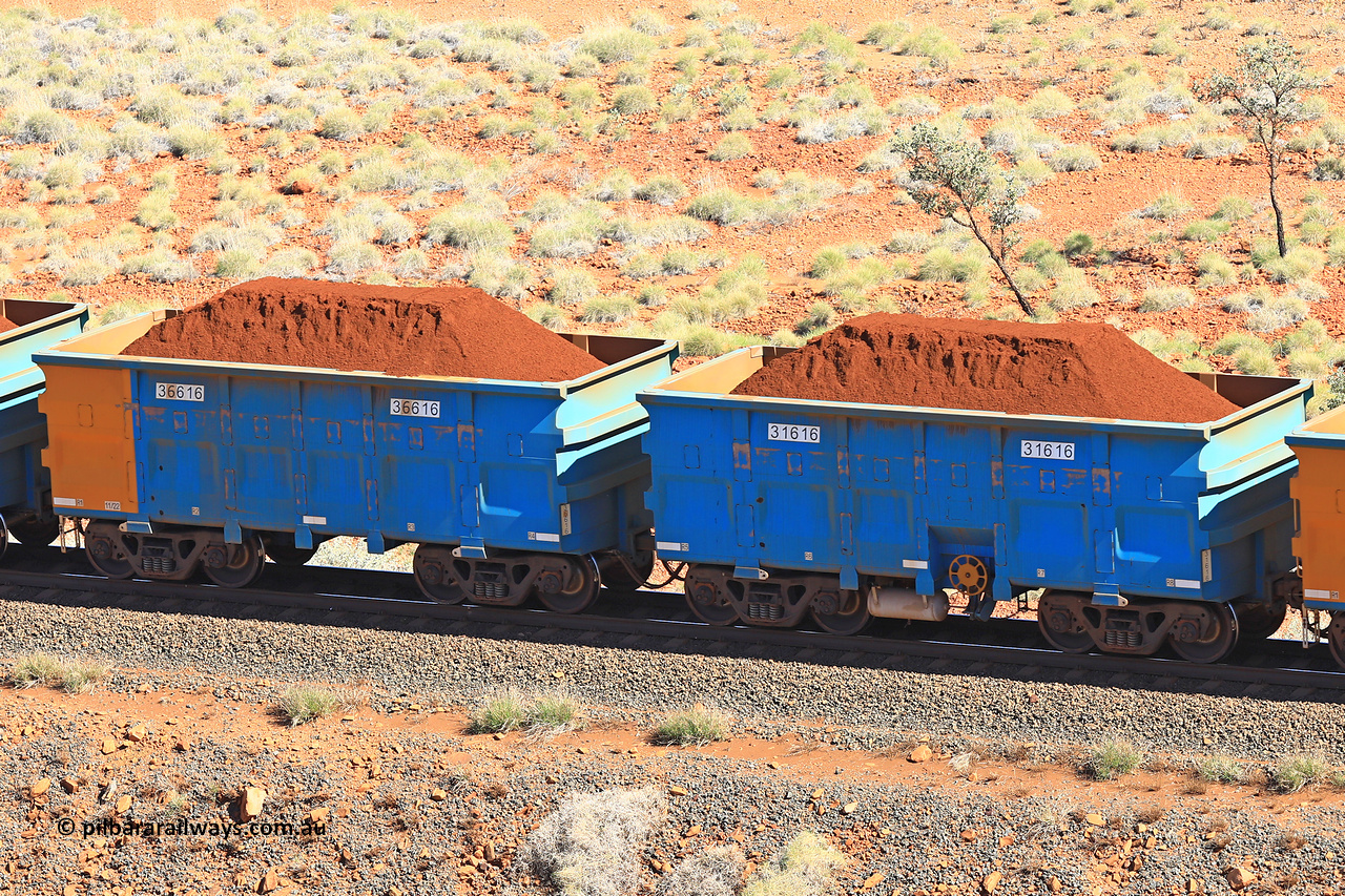 240701 2408
Western Creek, 67 km, one of Rio Tinto's blue rakes with spring assisted park brake and only electronic controlled pneumatic [ECP] braking, waggon pair 31616 is a master and is bar coupled to slave waggon 36616 built by China Northen as a Q type in 11/2022. Captured on July 1, 2024.
Keywords: 31616;36616;Q-type;China-Northern;Rio-ore-waggon;