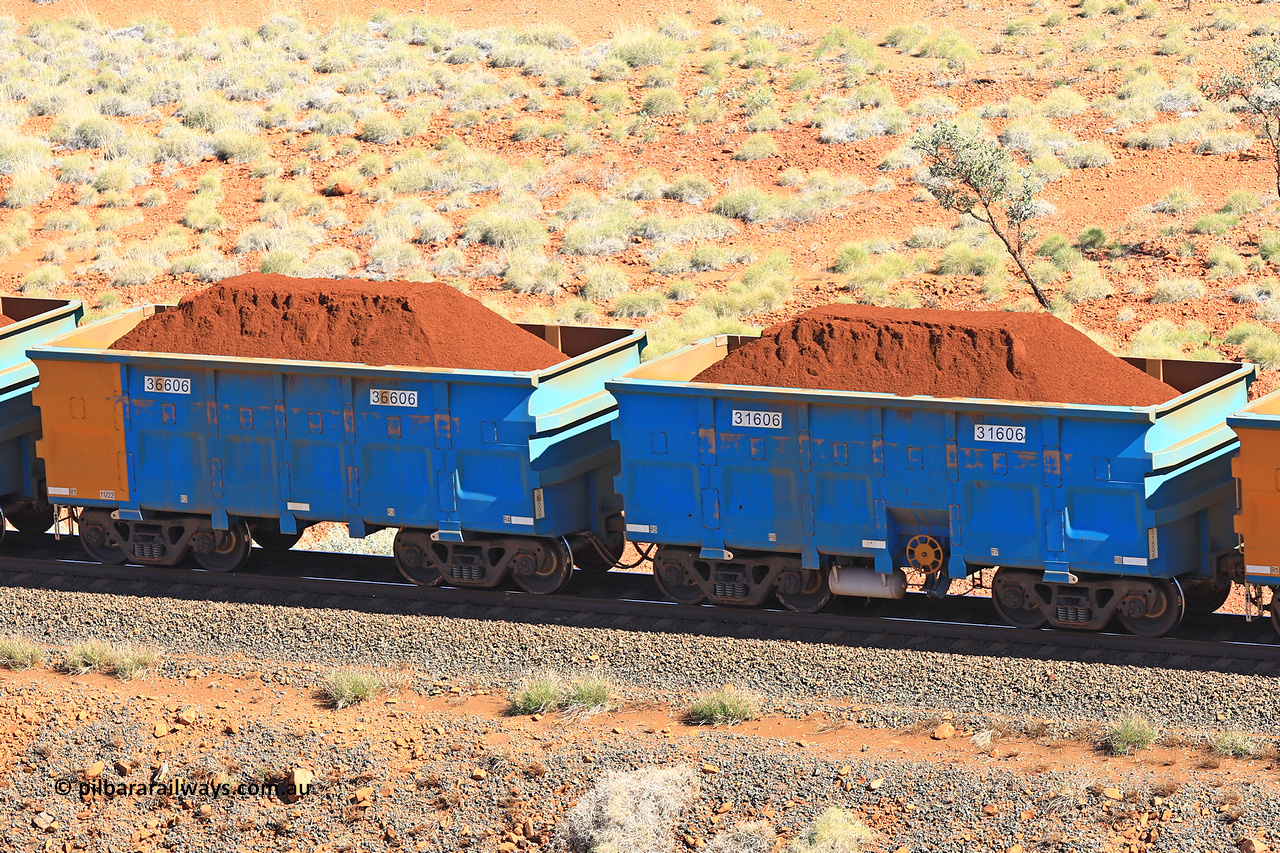 240701 2416
Western Creek, 67 km, one of Rio Tinto's blue rakes with spring assisted park brake and only electronic controlled pneumatic [ECP] braking, waggon pair 31606 is a master and is bar coupled to slave waggon 36606 built by China Northen as a Q type in 11/2022. Captured on July 1, 2024.
Keywords: 31606;36606;Q-type;China-Northern;Rio-ore-waggon;