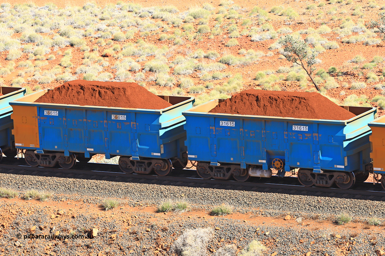 240701 2418
Western Creek, 67 km, one of Rio Tinto's blue rakes with spring assisted park brake and only electronic controlled pneumatic [ECP] braking, waggon pair 31615 is a master and is bar coupled to slave waggon 36615 built by China Northen as a Q type in 11/2022. Captured on July 1, 2024.
Keywords: 31615;36615;Q-type;China-Northern;Rio-ore-waggon;