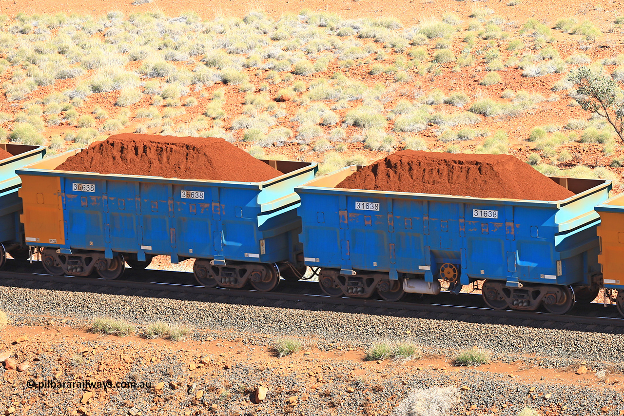 240701 2422
Western Creek, 67 km, one of Rio Tinto's blue rakes with spring assisted park brake and only electronic controlled pneumatic [ECP] braking, waggon pair 31638 is a master and is bar coupled to slave waggon 36638 built by China Northen as a Q type in 11/2022. Captured on July 1, 2024.
Keywords: 31638;36638;Q-type;China-Northern;Rio-ore-waggon;