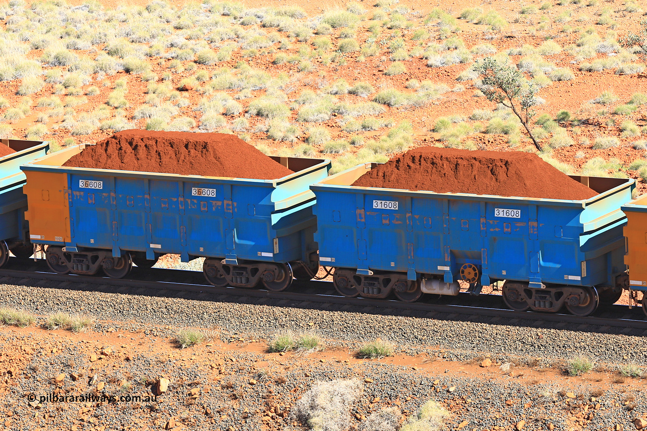 240701 2426
Western Creek, 67 km, one of Rio Tinto's blue rakes with spring assisted park brake and only electronic controlled pneumatic [ECP] braking, waggon pair 31608 is a master and is bar coupled to slave waggon 36608 built by China Northen as a Q type in 11/2022. Captured on July 1, 2024.
Keywords: 31608;36608;Q-type;China-Northern;Rio-ore-waggon;