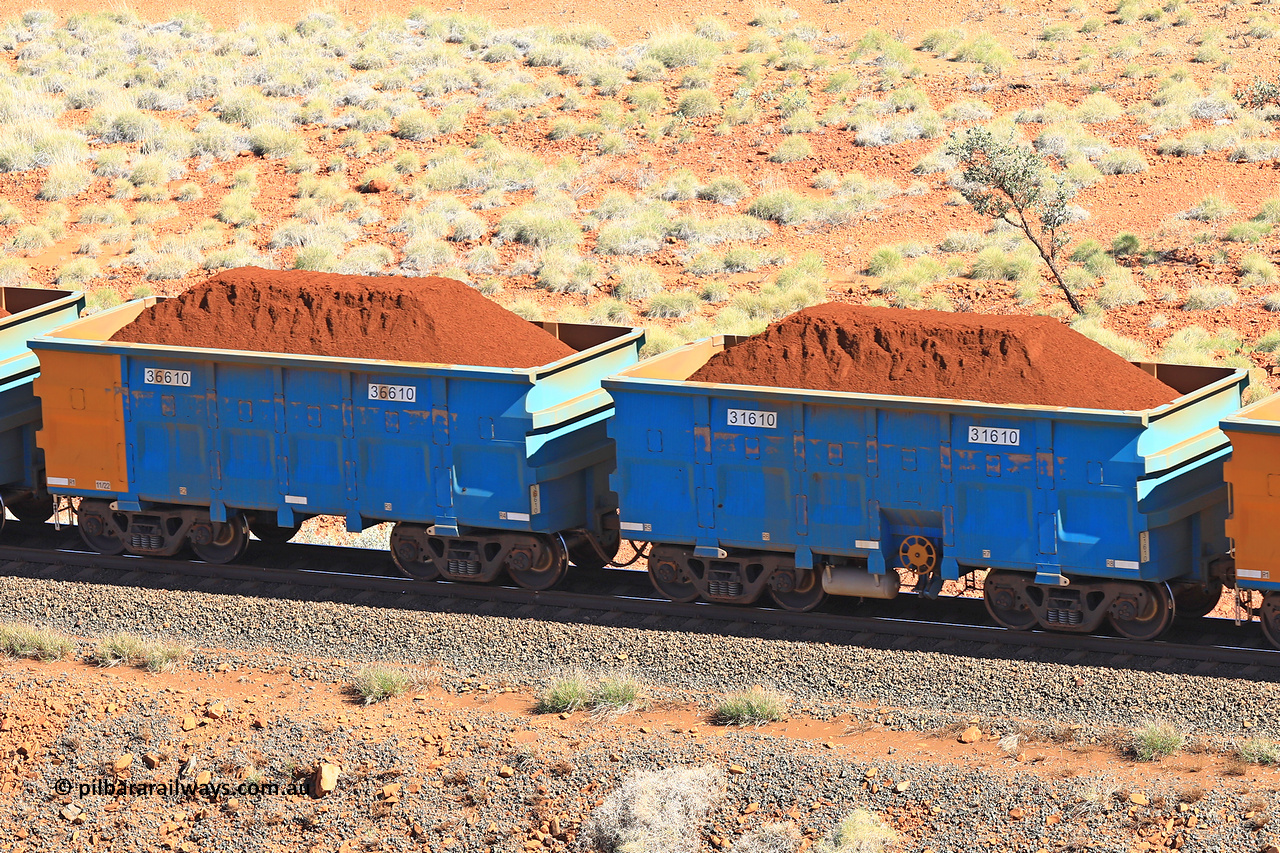 240701 2429
Western Creek, 67 km, one of Rio Tinto's blue rakes with spring assisted park brake and only electronic controlled pneumatic [ECP] braking, waggon pair 31610 is a master and is bar coupled to slave waggon 36610 built by China Northen as a Q type in 11/2022. Captured on July 1, 2024.
Keywords: 31610;36610;Q-type;China-Northern;Rio-ore-waggon;