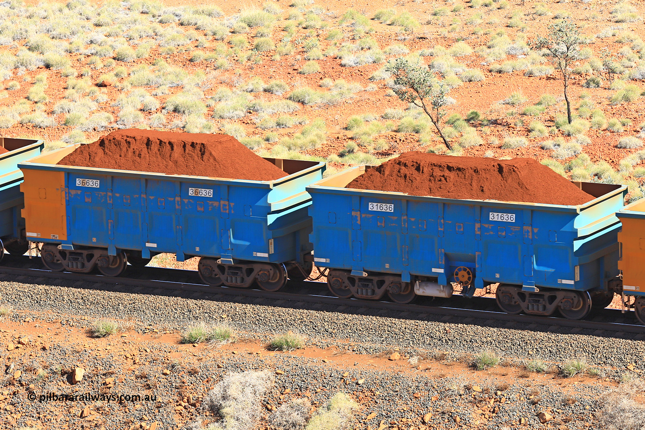 240701 2436
Western Creek, 67 km, one of Rio Tinto's blue rakes with spring assisted park brake and only electronic controlled pneumatic [ECP] braking, waggon pair 31636 is a master and is bar coupled to slave waggon 36636 built by China Northen as a Q type in 11/2022. Captured on July 1, 2024.
Keywords: 31636;36636;Q-type;China-Northern;Rio-ore-waggon;