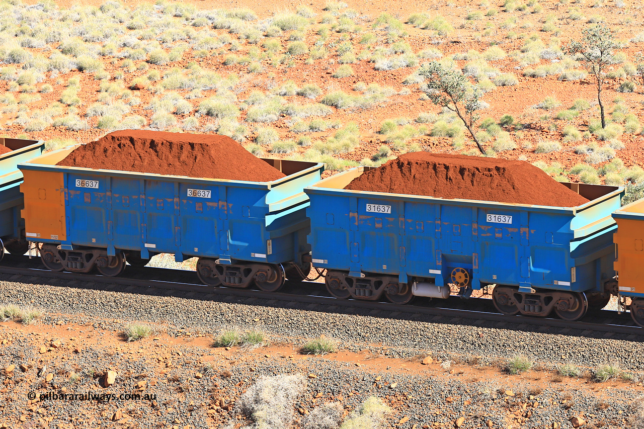 240701 2437
Western Creek, 67 km, one of Rio Tinto's blue rakes with spring assisted park brake and only electronic controlled pneumatic [ECP] braking, waggon pair 31637 is a master and is bar coupled to slave waggon 36637 built by China Northen as a Q type in 11/2022. Captured on July 1, 2024.
Keywords: 31637;36637;Q-type;China-Northern;Rio-ore-waggon;