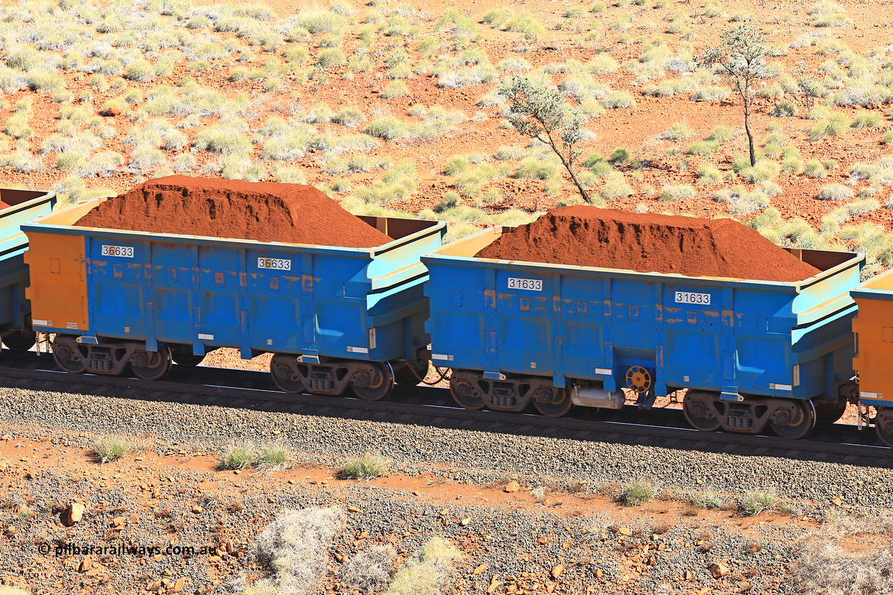 240701 2438
Western Creek, 67 km, one of Rio Tinto's blue rakes with spring assisted park brake and only electronic controlled pneumatic [ECP] braking, waggon pair 31633 is a master and is bar coupled to slave waggon 36633 built by China Northen as a Q type in 11/2022. Captured on July 1, 2024.
Keywords: 31633;36633;Q-type;China-Northern;Rio-ore-waggon;