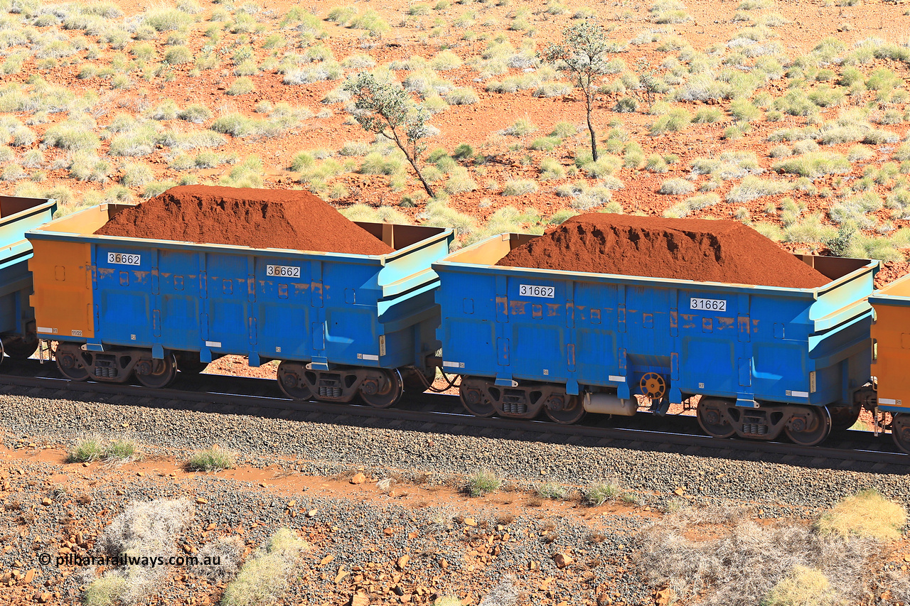 240701 2440
Western Creek, 67 km, one of Rio Tinto's blue rakes with spring assisted park brake and only electronic controlled pneumatic [ECP] braking, waggon pair 31662 is a master and is bar coupled to slave waggon 36662 built by China Northen as a Q type in 11/2022. Captured on July 1, 2024.
Keywords: 31662;36662;Q-type;China-Northern;Rio-ore-waggon;