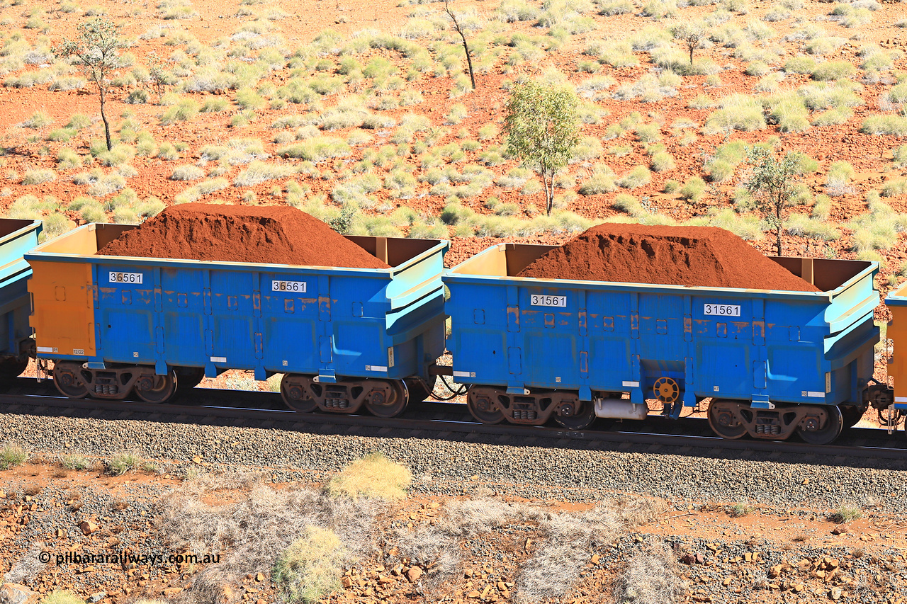 240701 2445
Western Creek, 67 km, one of Rio Tinto's blue rakes with spring assisted park brake and only electronic controlled pneumatic [ECP] braking, waggon pair 31561 is a master and is bar coupled to slave waggon 36561 built by China Northen as a Q type in 12/2022. Captured on July 1, 2024.
Keywords: 31561;36561;Q-type;China-Northern;Rio-ore-waggon;