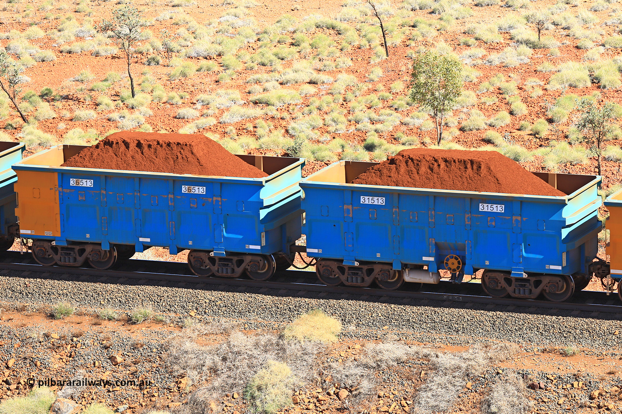 240701 2453
Western Creek, 67 km, one of Rio Tinto's blue rakes with spring assisted park brake and only electronic controlled pneumatic [ECP] braking, waggon pair 31513 is a master and is bar coupled to slave waggon 36513 built by China Northen as a Q type in 12/2022. Captured on July 1, 2024.
Keywords: 31513;36513;Q-type;China-Northern;Rio-ore-waggon;