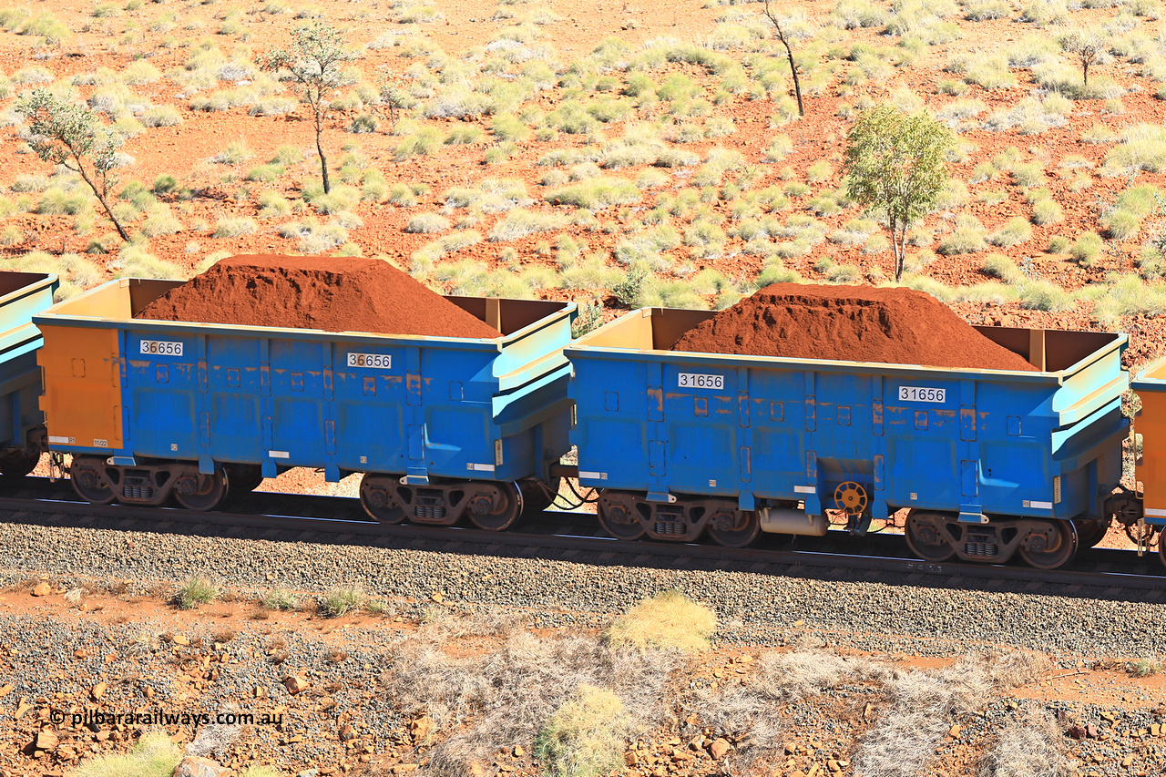 240701 2458
Western Creek, 67 km, one of Rio Tinto's blue rakes with spring assisted park brake and only electronic controlled pneumatic [ECP] braking, waggon pair 31656 is a master and is bar coupled to slave waggon 36656 built by China Northen as a Q type in 11/2022. Captured on July 1, 2024.
Keywords: 31656;36656;Q-type;China-Northern;Rio-ore-waggon;
