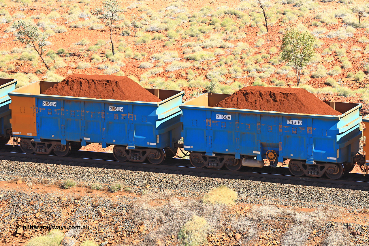 240701 2466
Western Creek, 67 km, one of Rio Tinto's blue rakes with spring assisted park brake and only electronic controlled pneumatic [ECP] braking, waggon pair 31609 is a master and is bar coupled to slave waggon 36609 built by China Northen as a Q type in 11/2022. Captured on July 1, 2024.
Keywords: 31609;36609;Q-type;China-Northern;Rio-ore-waggon;