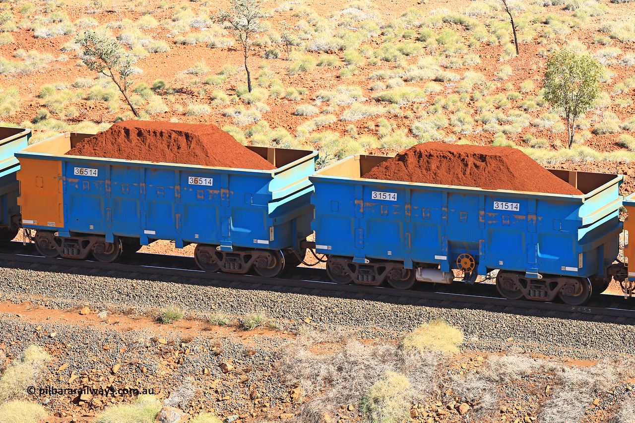 240701 2475
Western Creek, 67 km, one of Rio Tinto's blue rakes with spring assisted park brake and only electronic controlled pneumatic [ECP] braking, waggon pair 31514 is a master and is bar coupled to slave waggon 36514 built by China Northen as a Q type in 12/2022. Captured on July 1, 2024.
Keywords: 31514;36514;Q-type;China-Northern;Rio-ore-waggon;