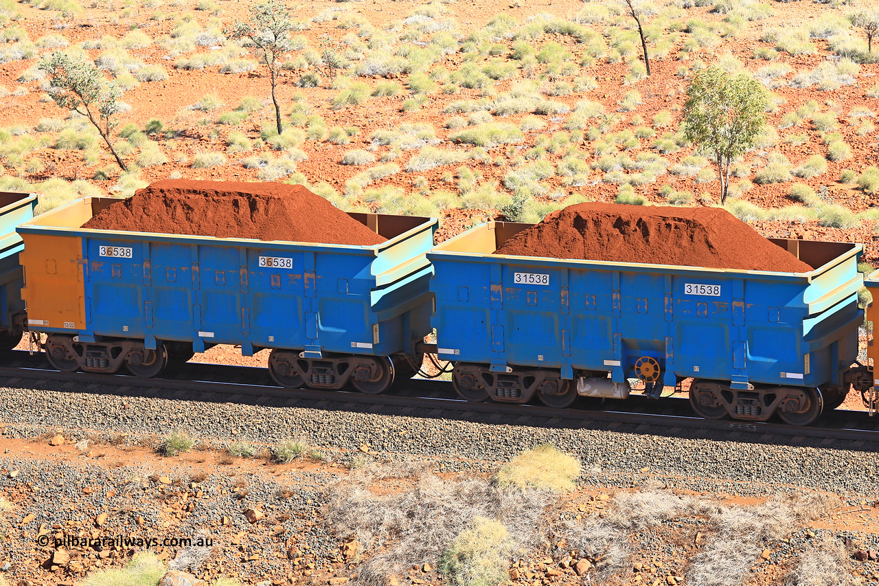 240701 2493
Western Creek, 67 km, one of Rio Tinto's blue rakes with spring assisted park brake and only electronic controlled pneumatic [ECP] braking, waggon pair 31538 is a master and is bar coupled to slave waggon 36538 built by China Northen as a Q type in 12/2022. Captured on July 1, 2024.
Keywords: 31538;36538;Q-type;China-Northern;Rio-ore-waggon;
