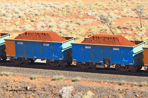 240701 2391
Western Creek, 67 km, one of Rio Tinto's blue rakes with spring assisted park brake and only electronic controlled pneumatic [ECP] braking, waggon pair 31682 is a master and is bar coupled to slave waggon 36682 built by China Northen as a Q type in 11/2022. Captured on July 1, 2024.
Keywords: 31682;36682;Q-type;China-Northern;Rio-ore-waggon;