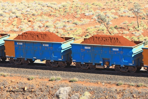 240701 2417
Western Creek, 67 km, one of Rio Tinto's blue rakes with spring assisted park brake and only electronic controlled pneumatic [ECP] braking, waggon pair 31593 is a master and is bar coupled to slave waggon 36593 built by China Northen as a Q type in 11/2022. Captured on July 1, 2024.
Keywords: 31593;36593;Q-type;China-Northern;Rio-ore-waggon;