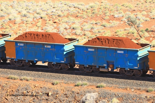 240701 2432
Western Creek, 67 km, one of Rio Tinto's blue rakes with spring assisted park brake and only electronic controlled pneumatic [ECP] braking, waggon pair 31596 is a master and is bar coupled to slave waggon 36596 built by China Northen as a Q type in 11/2022. Captured on July 1, 2024.
Keywords: 31596;36596;Q-type;China-Northern;Rio-ore-waggon;