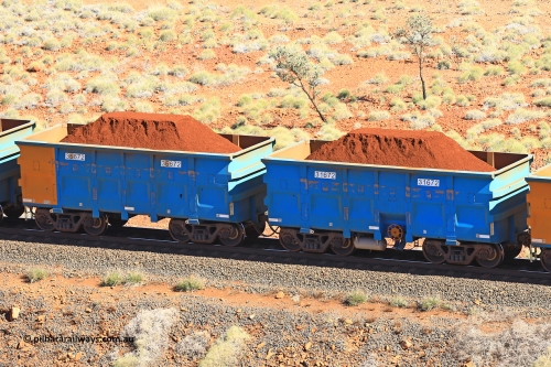 240701 2441
Western Creek, 67 km, one of Rio Tinto's blue rakes with spring assisted park brake and only electronic controlled pneumatic [ECP] braking, waggon pair 31672 is a master and is bar coupled to slave waggon 36672 built by China Northen as a Q type in 11/2022. Captured on July 1, 2024.
Keywords: 31672;36672;Q-type;China-Northern;Rio-ore-waggon;