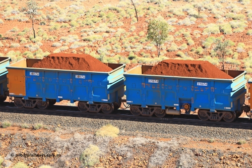 240701 2449
Western Creek, 67 km, one of Rio Tinto's blue rakes with spring assisted park brake and only electronic controlled pneumatic [ECP] braking, waggon pair 31674 is a master and is bar coupled to slave waggon 36674 built by China Northen as a Q type in 11/2022. Captured on July 1, 2024.
Keywords: 31674;36674;Q-type;China-Northern;Rio-ore-waggon;