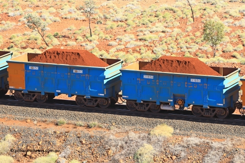 240701 2469
Western Creek, 67 km, one of Rio Tinto's blue rakes with spring assisted park brake and only electronic controlled pneumatic [ECP] braking, waggon pair 31650 is a master and is bar coupled to slave waggon 36650 built by China Northen as a Q type in 12/2022. Captured on July 1, 2024.
Keywords: 31650;36650;Q-type;China-Northern;Rio-ore-waggon;
