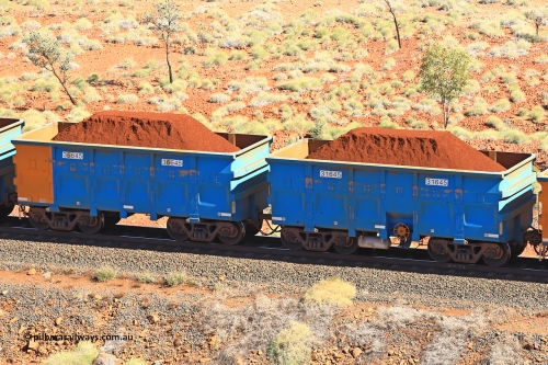 240701 2489
Western Creek, 67 km, one of Rio Tinto's blue rakes with spring assisted park brake and only electronic controlled pneumatic [ECP] braking, waggon pair 31645 is a master and is bar coupled to slave waggon 36645 built by China Northen as a Q type in 11/2022. Captured on July 1, 2024.
Keywords: 31645;36645;Q-type;China-Northern;Rio-ore-waggon;