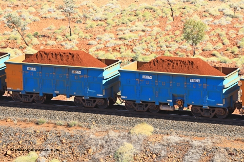 240701 2502
Western Creek, 67 km, one of Rio Tinto's blue rakes with spring assisted park brake and only electronic controlled pneumatic [ECP] braking, waggon pair 31574 is a master and is bar coupled to slave waggon 36574 built by China Northen as a Q type in 11/2022. Captured on July 1, 2024.
Keywords: 31574;36574;Q-type;China-Northern;Rio-ore-waggon;