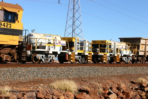 060723 7684
Original Hamersley Iron compressor waggon sets IC-6 and IC-7 which were made from cutting down condemned ore waggons and then fitting Atlas Copco XAS 97 air compressors, receiver tanks and fuel tanks. Seen here on the causeway just outside 7 Mile. 23rd July 2006.
Keywords: IC-6;IC-7;rio-compressor-waggon;