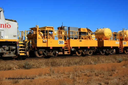 100330 8066
Rio Tinto compressor waggon set CB 05, compressor control waggon with two diesel powered Atlas Copco XAS 97's behind the loco and the receiver waggon with two air tanks or receivers closet to camera. Note the waggons are cut down ore waggons. Seen here just outside of 7 Mile. 30th March 2010.
Keywords: CB05;rio-compressor-waggon;