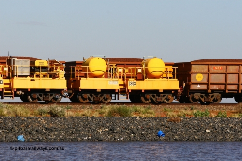 110602 8647
Rio Tinto compressor waggon set CB 03, receiver waggon with two air tanks or receivers. These are built on former ore waggons that have been cut down. Seen here on the causeway just outside of 7 Mile. 2nd June 2011.
Keywords: CB03;rio-compressor-waggon;