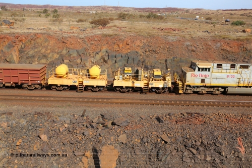 141124 7078
Rio Tinto compressor waggon set leader CB 01, compressor control waggon with two diesel powered Atlas Copco XAS 97's behind the loco and the receiver waggon with two air tanks or receivers. Note the waggons are cut down ore waggons. Seen here at Parker Point, Dampier on 24th November 2014.
Keywords: CB01;rio-compressor-waggon;