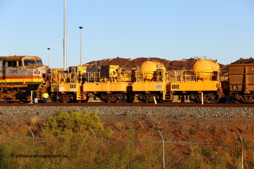 170728 09678
Rio Tinto compressor waggon set CB 12, compressor control waggon with two diesel powered Kaeser M57 Utility air compressors and the receiver waggon with two air tanks or receivers. Note the waggons are modified ore waggon frames. Seen here at Cape Lambert. 28th July 2017.
Keywords: CB12;rio-compressor-waggon;