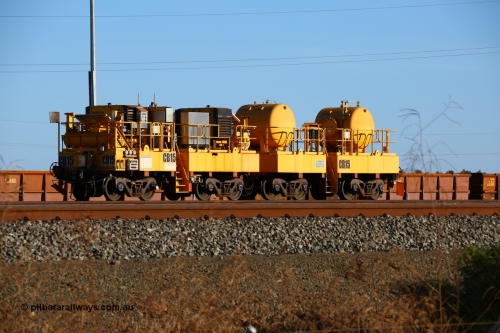 171018 0734
Rio Tinto compressor waggon set CB 15, compressor control waggon with two diesel powered Kaeser M57 Utility air compressors and the receiver waggon with two air tanks or receivers. Note the waggons are modified ore waggon frames. Seen here at Cape Lambert. 18th October 2017.
Keywords: CB15;rio-compressor-waggon;