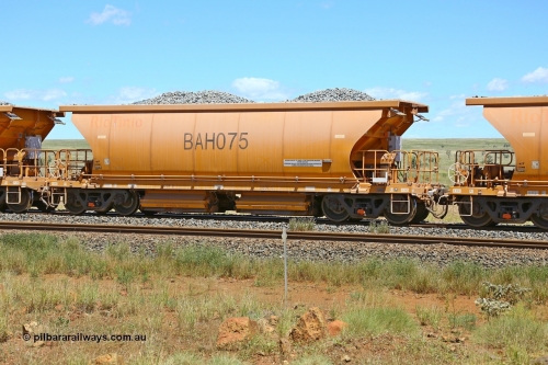 210322 9579
Near Gecko on Rio Tinto's Dampier - Tom Price line is Chinese built ballast waggon BAH 075 on a loaded ballast rake. Location is roughly [url=https://goo.gl/maps/XZkGLreipQwHrTjw9]here[/url]. 22nd March 2021.
Keywords: BAH-type;BAH075;Rio-ballast-waggon;