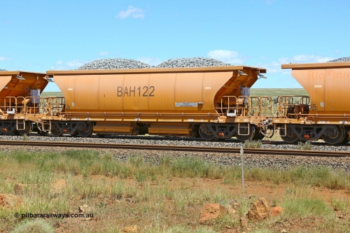 210322 9580
Near Gecko on Rio Tinto's Dampier - Tom Price line is Chinese built ballast waggon BAH 122 on a loaded ballast rake. Location is roughly [url=https://goo.gl/maps/XZkGLreipQwHrTjw9]here[/url]. 22nd March 2021.
Keywords: BAH-type;BAH122;Rio-ballast-waggon;