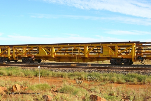 210510 1117
Near Gull on the Rio Tinto Dampier - Tom Price line at the 101.5 km, RTS type straddle crane carrying rail waggon RTS 003 on Rio Tinto's Gemco Rail built rail train consist. 10th May 2021. [url=https://goo.gl/maps/9WbRn1E4vP6a1YbN8]Location[/url].
Keywords: RTS-type;RTS003;Gemco-Rail-WA;