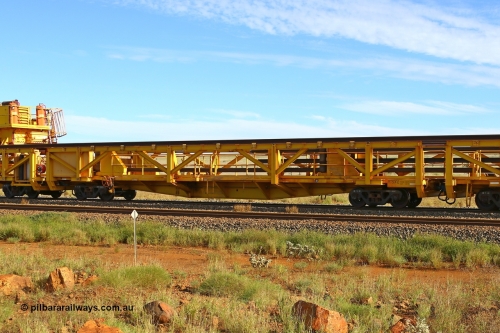 210510 1118
Near Gull on the Rio Tinto Dampier - Tom Price line at the 101.5 km, RTS type straddle crane carrying rail waggon RTS 002 on Rio Tinto's Gemco Rail built rail train consist. 10th May 2021. [url=https://goo.gl/maps/9WbRn1E4vP6a1YbN8]Location[/url].
Keywords: RTS-type;RTS002;Gemco-Rail-WA;