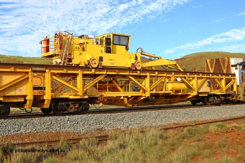 210510 1152
Near Galah on the Rio Tinto Dampier - Tom Price line at the 89.5 km, RTS type chute and straddle crane carrying rail waggon RTS 001 on Rio Tinto's Gemco Rail built rail train consist. 10th May 2021. [url=https://goo.gl/maps/tSmgEtp7gcG7x24b9]Location[/url].
Keywords: RTS-type;RTS001;Gemco-Rail-WA