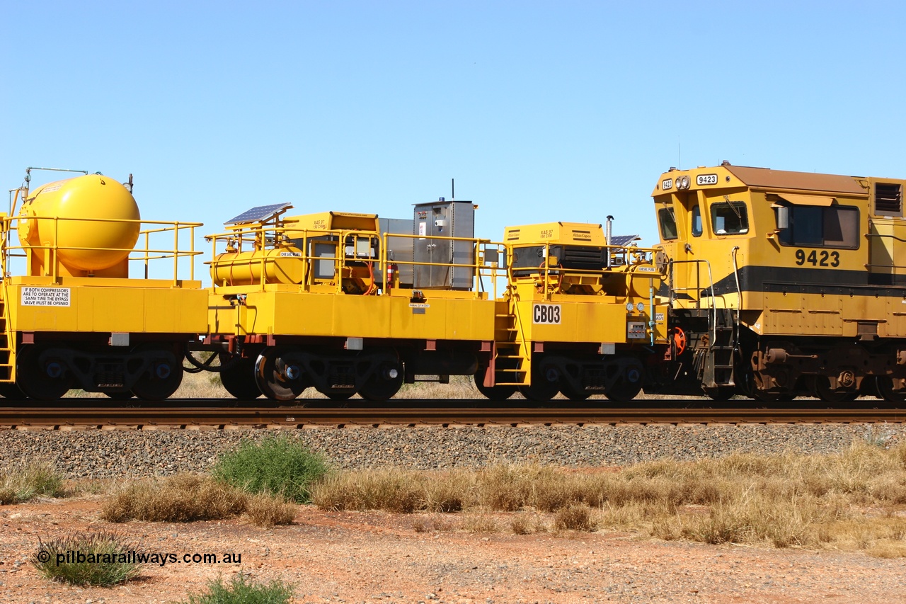 060723 7762
Rio Tinto compressor waggon set CB 03, compressor control waggon with two diesel powered Atlas Copco XAS 97's. These are built on former ore waggons that have been cut down. Seen here just outside of 7 Mile. 23rd July 2006.
Keywords: CB03;rio-compressor-waggon;